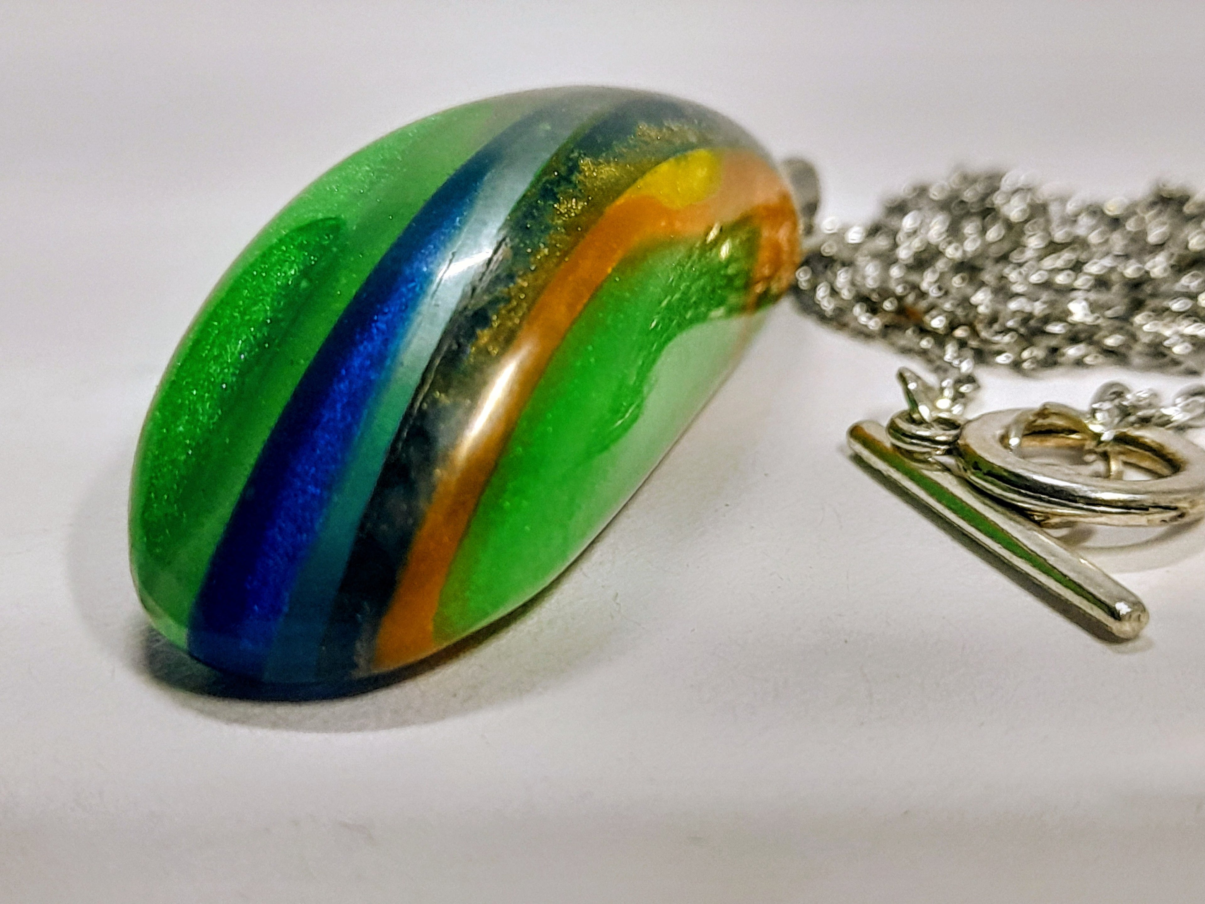 Hand-Carved Resin Pendant Necklace – Green, Blue & Orange Abstract Design | One of a Kind