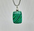 Natural malachite stone pendant with emerald green swirling pattern on a silver-tone rolo chain